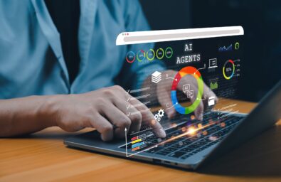 User,Analyzing,Ai,Agent,Performance,Data,On,A,Laptop,With